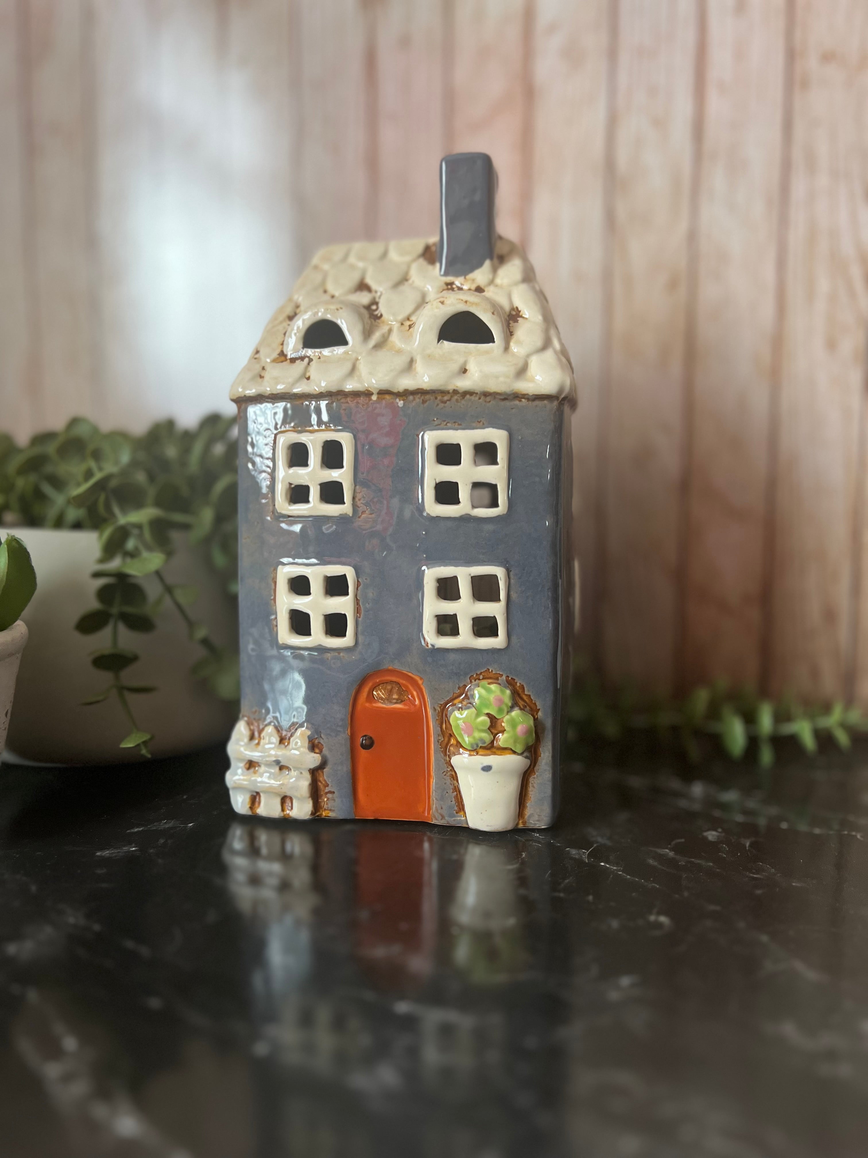 Tall Grey House With Lots of Detail Plant, Gate, Lovely Tea Light Holder