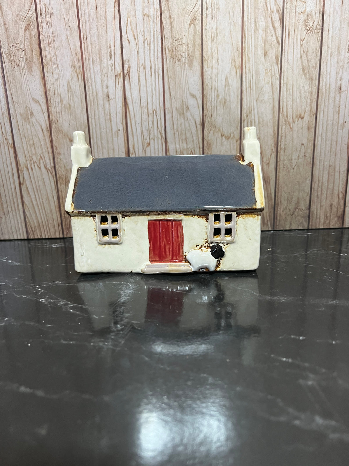 Croft House Navy Roof with Red Door and Sheep waiting Patiently 15cm W x 8cm D x 11cm H