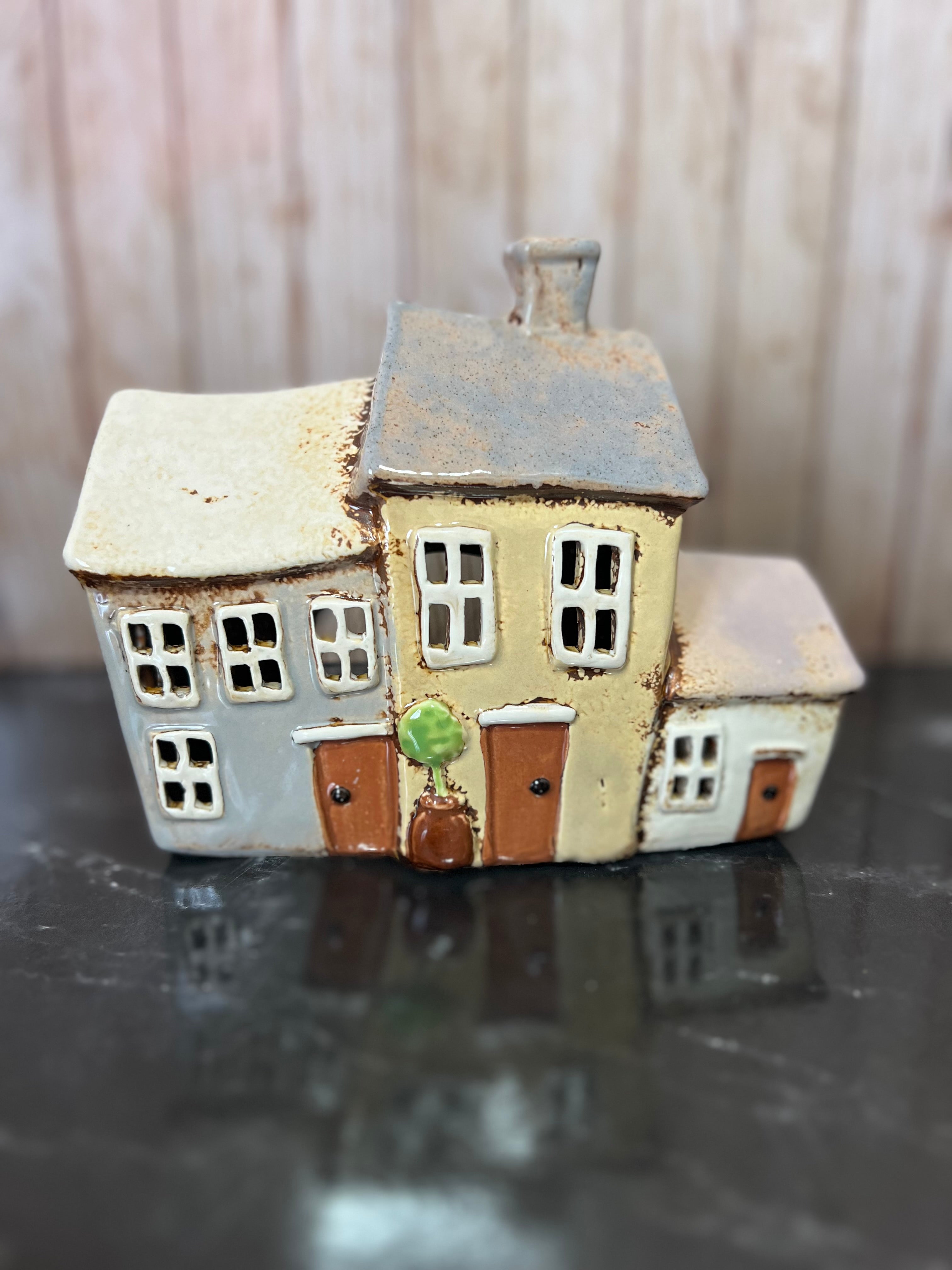 3 in A Row Brown Houses Tea Light Holder 18cm W x 8cm D x 14cm H