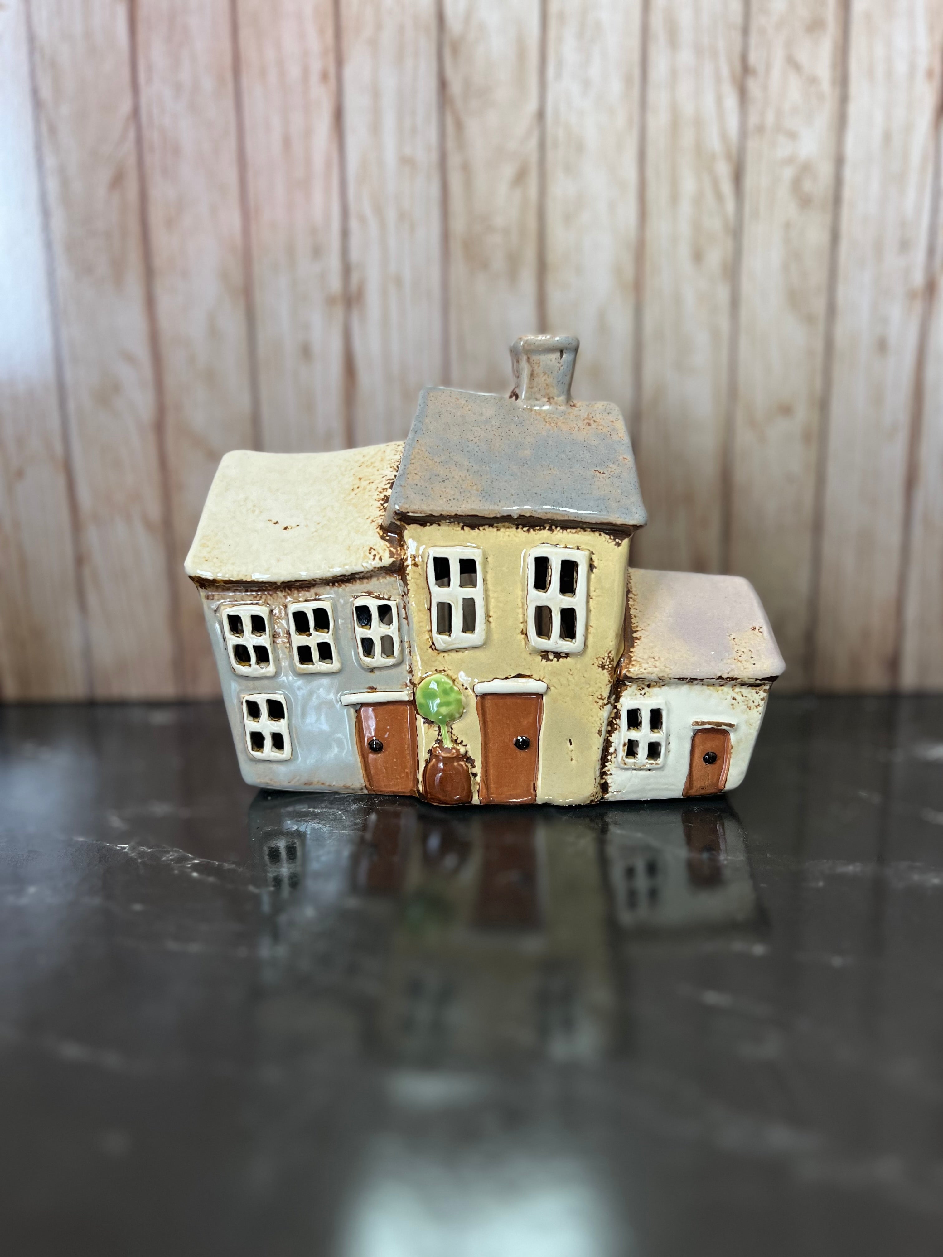 3 in A Row Brown Houses Tea Light Holder 18cm W x 8cm D x 14cm H