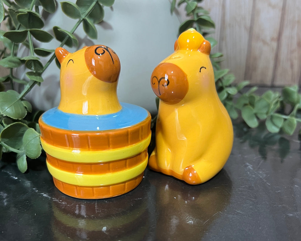 capybara salt and pepper shakers with playful design and vibrant colors in a kitchen setting